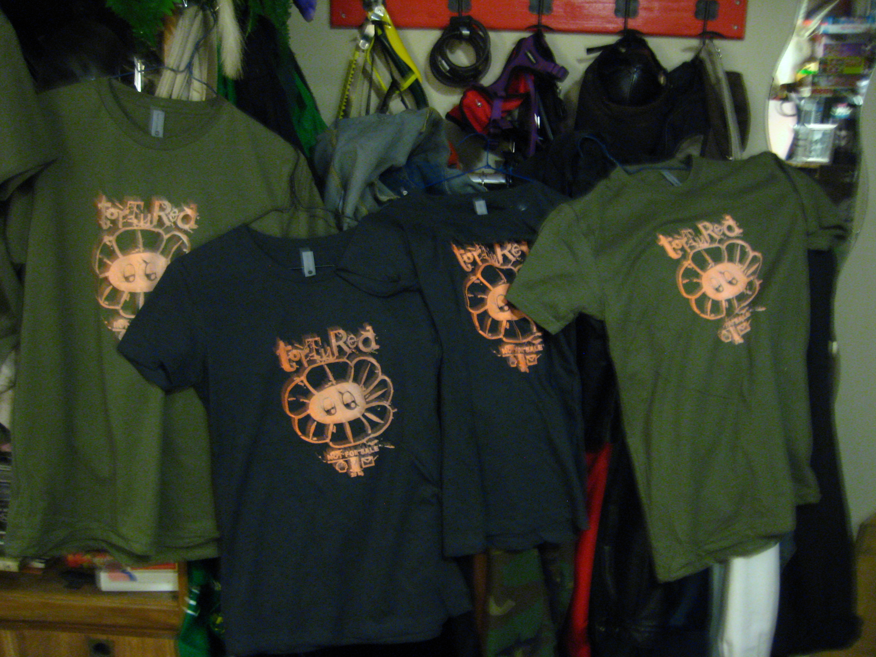 'tortured' design shirts drying